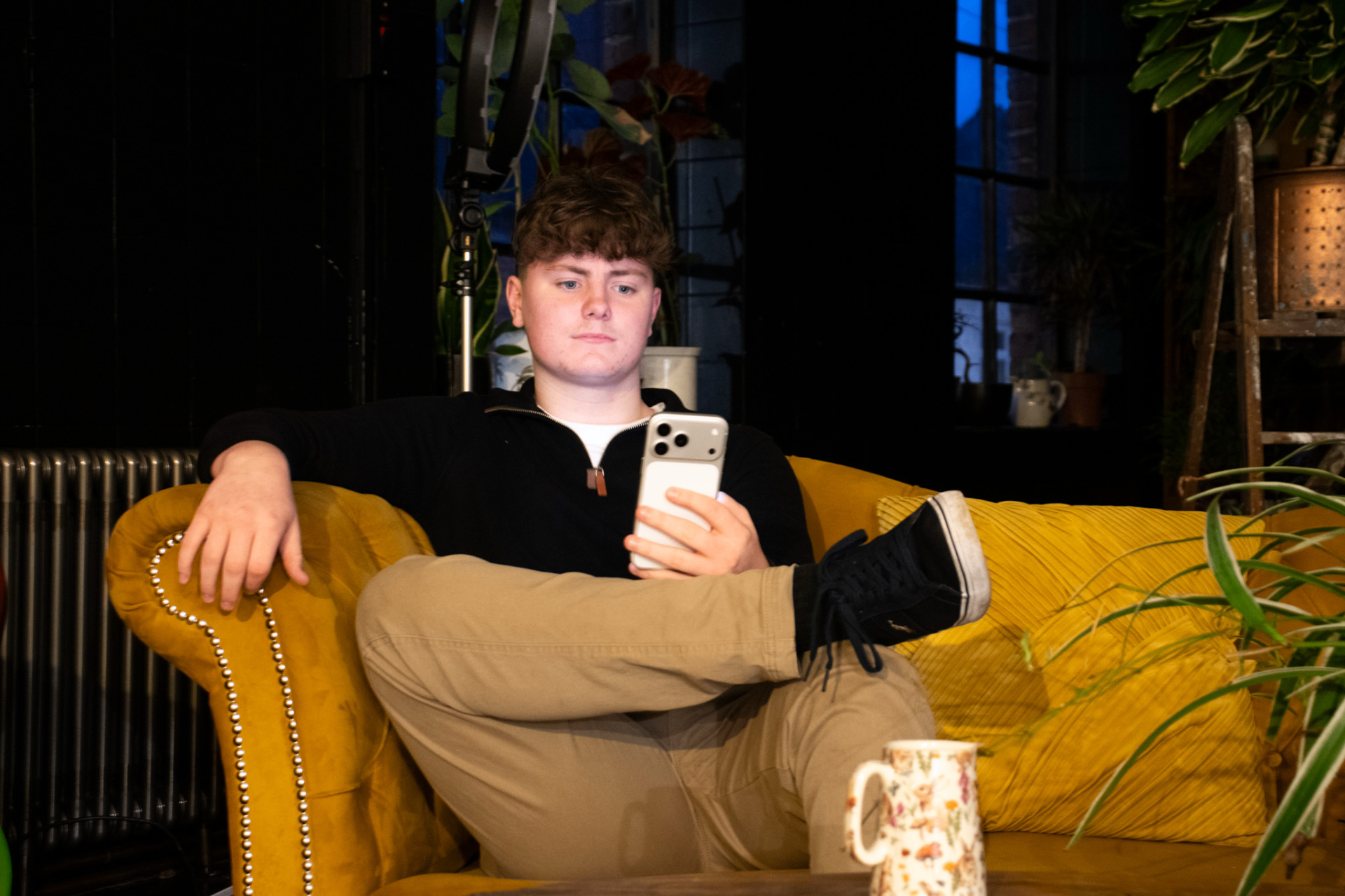 Founder using Trackr on couch